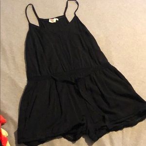 Black romper ties in the front, soft material